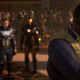 A screenshot from the War for Wakanda expansion for Marvel's Avengers with T'Challa in front and Tony and Cap in the blurry background.